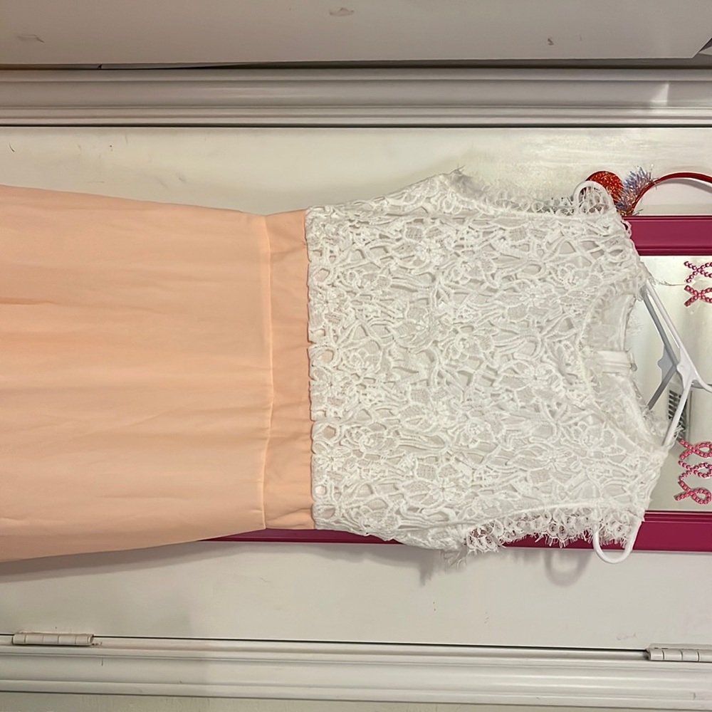 Dress size XXL but fits like a large, never worn ordered online